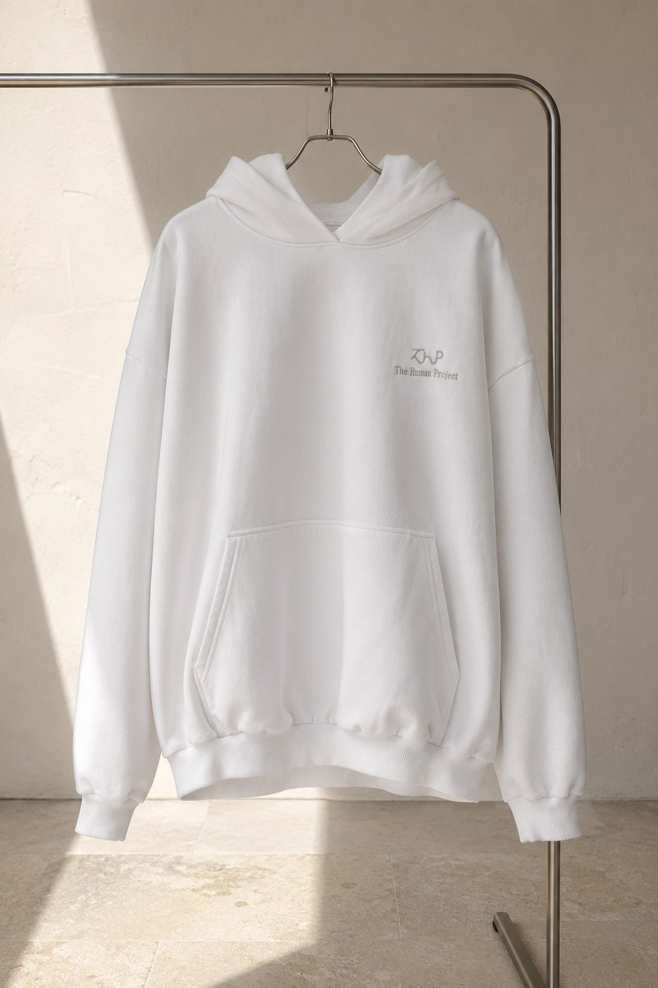 Hoodie on a hanger in sunlight